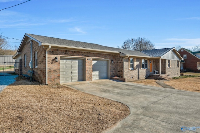 single story home with an attached garage, brick siding, fence, driveway, and roof with shingles