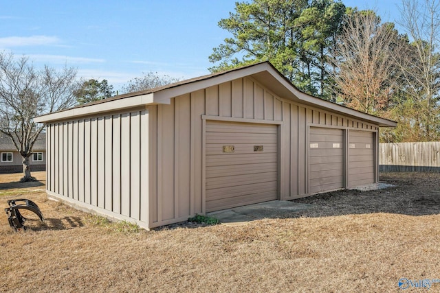 detached garage with fence