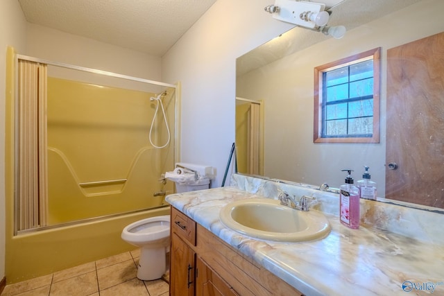 bathroom with toilet, vanity, tile patterned floors, combined bath / shower with glass door, and a textured ceiling