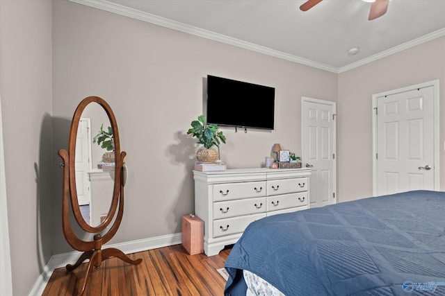 bedroom featuring crown molding, ceiling fan, and wood-type flooring