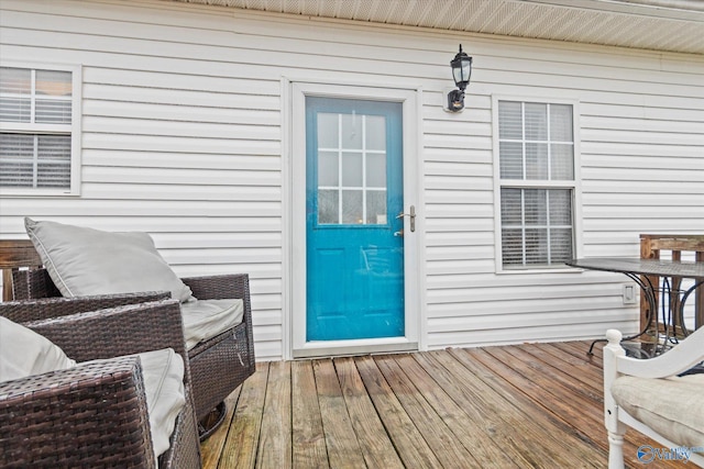 doorway to property with a deck