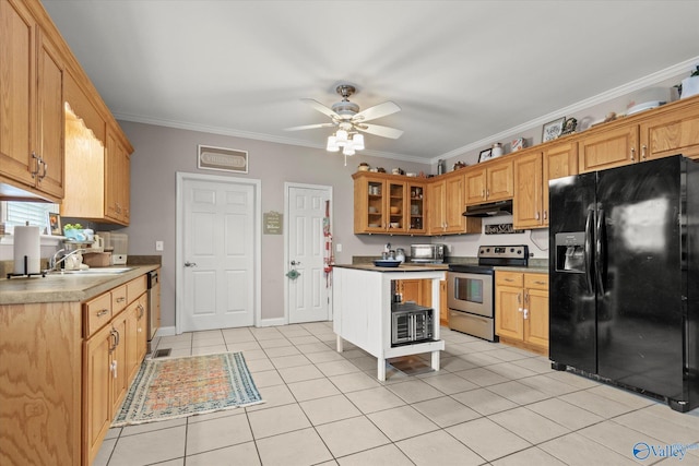 kitchen featuring crown molding, appliances with stainless steel finishes, sink, and light tile patterned floors