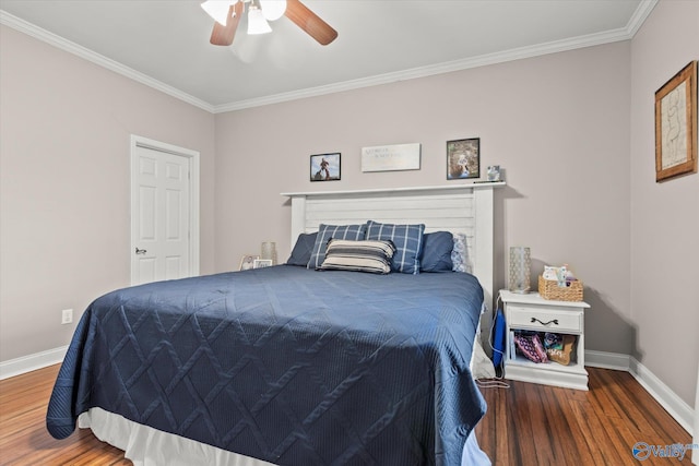 bedroom featuring crown molding, ceiling fan, and hardwood / wood-style floors