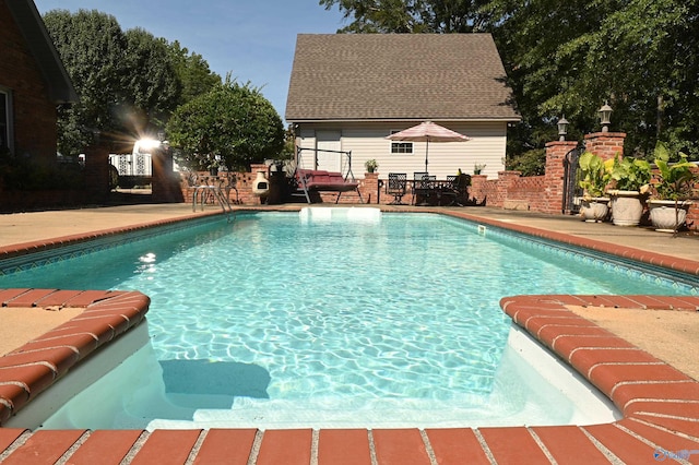 view of pool featuring a patio area