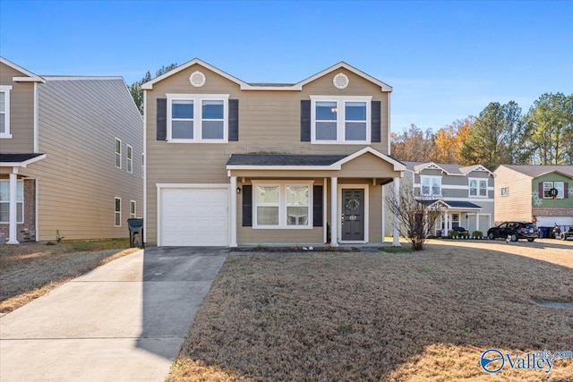 view of front of property with a garage