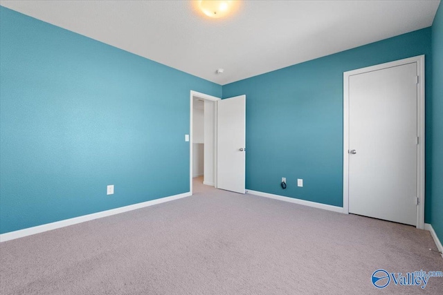 unfurnished bedroom with carpet