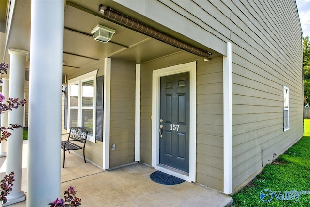 entrance to property with covered porch