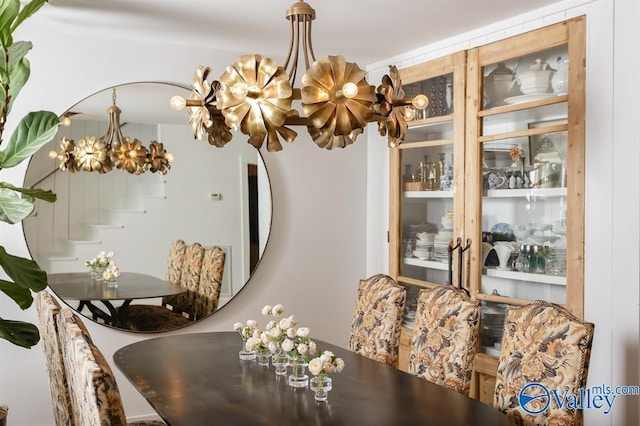 dining area with a chandelier