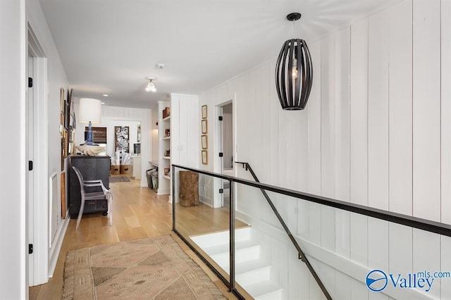 corridor featuring light hardwood / wood-style floors