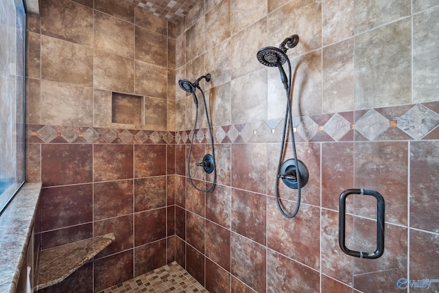 bathroom featuring a stall shower