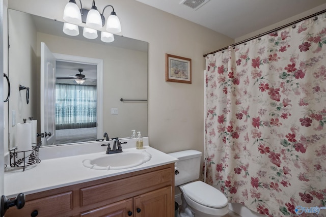 full bathroom featuring curtained shower, visible vents, vanity, and toilet