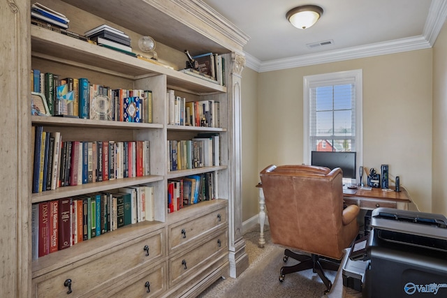 carpeted home office with ornamental molding, visible vents, and baseboards