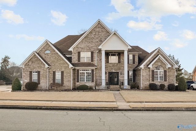 view of front of property with brick siding