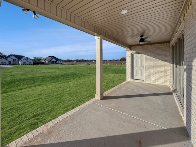 view of patio / terrace featuring ceiling fan