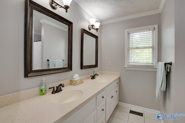 bathroom featuring crown molding, a sink, and double vanity