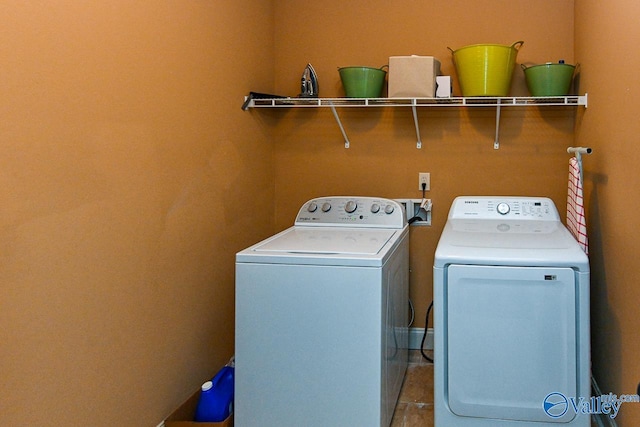 laundry room featuring washer and dryer and laundry area