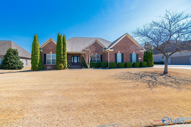 view of front of property featuring brick siding