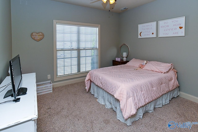 bedroom featuring visible vents, carpet flooring, and baseboards