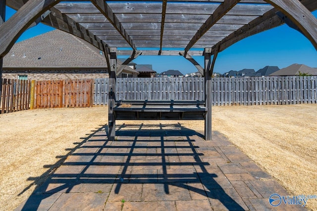 view of patio / terrace featuring a pergola and a fenced backyard