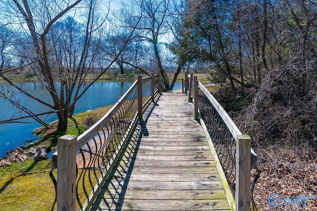 view of home's community featuring a water view