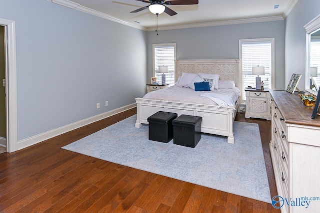 bedroom with visible vents, dark wood finished floors, crown molding, baseboards, and ceiling fan