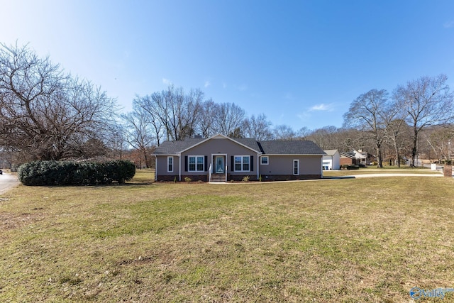 ranch-style home featuring a front lawn