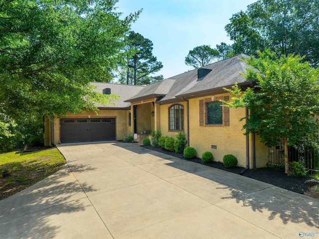 1805 Sibert Dr, Glencoe, AL 35905 - ranch-style house featuring roof with shingles, driveway, an attached garage, brick siding, and crawl space