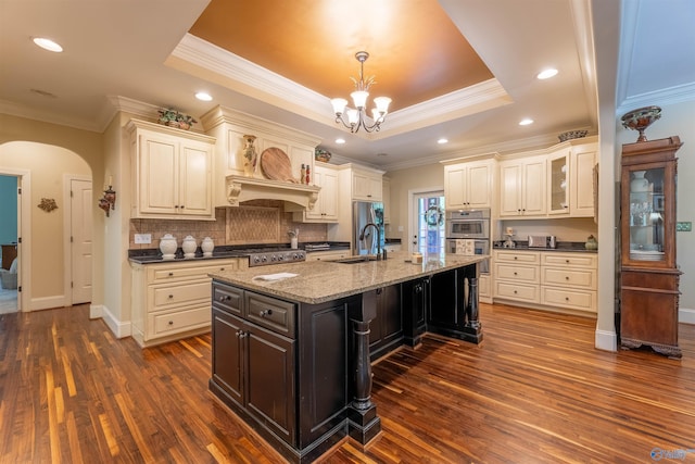1805 Sibert Dr, Glencoe, AL 35905 - kitchen with appliances with stainless steel finishes, arched walkways, dark wood-style flooring, crown molding, and a sink