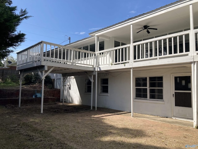 625 S Mountain Dr E, Trinity, AL 35673 - rear view of property with a deck, ceiling fan, and stucco siding