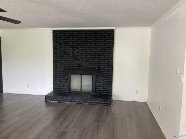 625 S Mountain Dr E, Trinity, AL 35673 - unfurnished living room featuring a textured ceiling, ceiling fan, ornamental molding, and wood finished floors