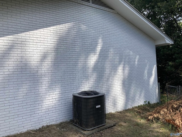 625 S Mountain Dr E, Trinity, AL 35673 - view of home's exterior featuring central air condition unit and brick siding