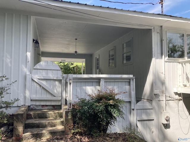 625 S Mountain Dr E, Trinity, AL 35673 - doorway to property featuring a gate and board and batten siding