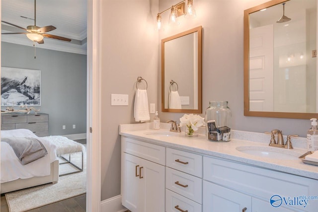 bathroom with vanity, crown molding, hardwood / wood-style flooring, and ceiling fan