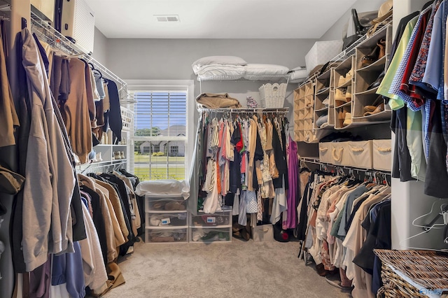 walk in closet with carpet flooring and visible vents