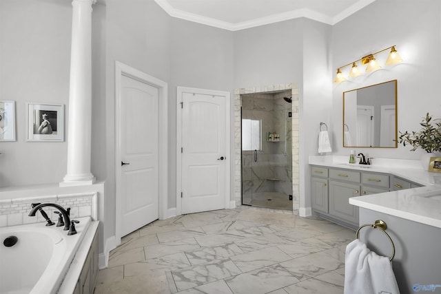bathroom featuring ornate columns, a shower stall, and marble finish floor