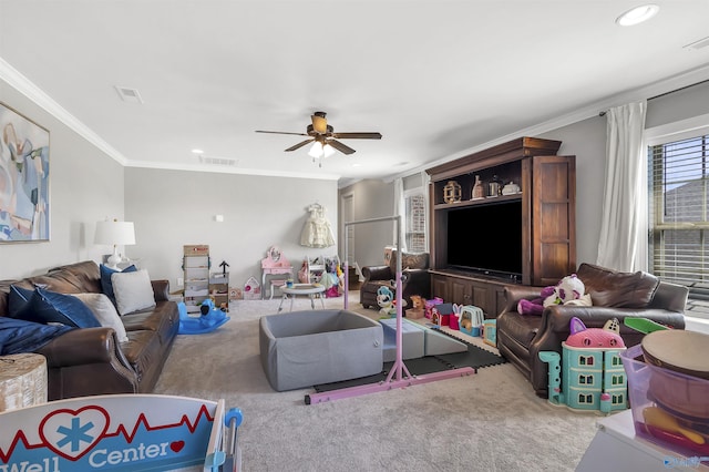carpeted living room with crown molding, recessed lighting, ceiling fan, and visible vents