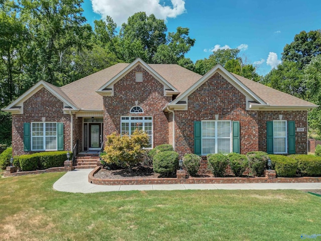 view of front of house with a front lawn