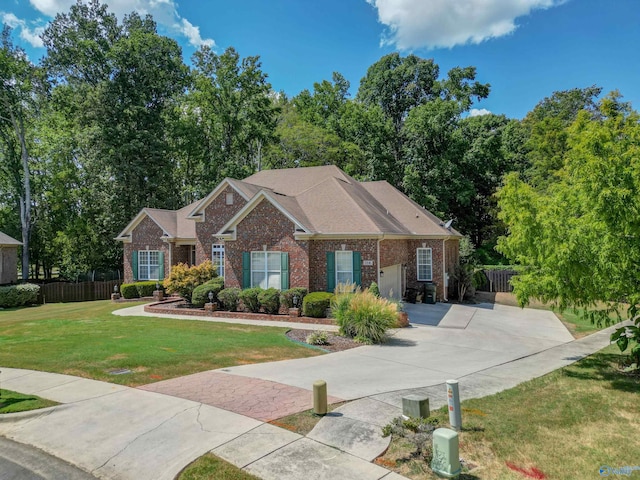 ranch-style home with a front lawn