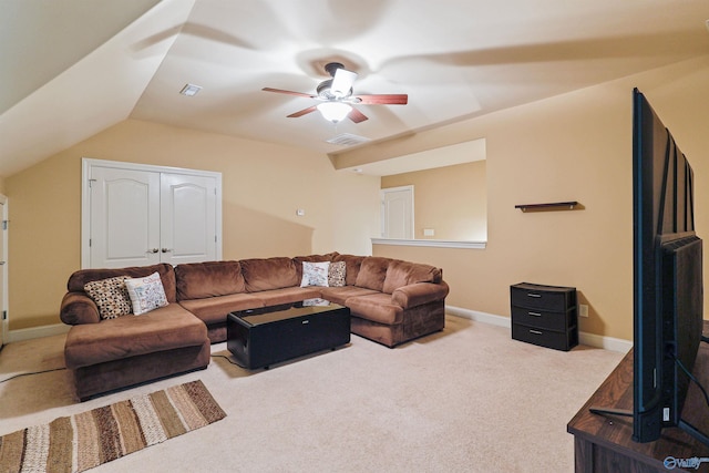 living room featuring lofted ceiling, ceiling fan, and carpet floors