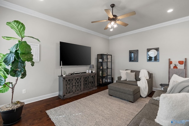 living room with dark hardwood / wood-style floors, ceiling fan, and crown molding