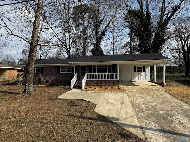 ranch-style home with a carport