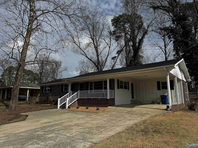 view of front of home featuring a carport