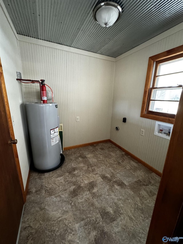 clothes washing area with hookup for a washing machine and water heater