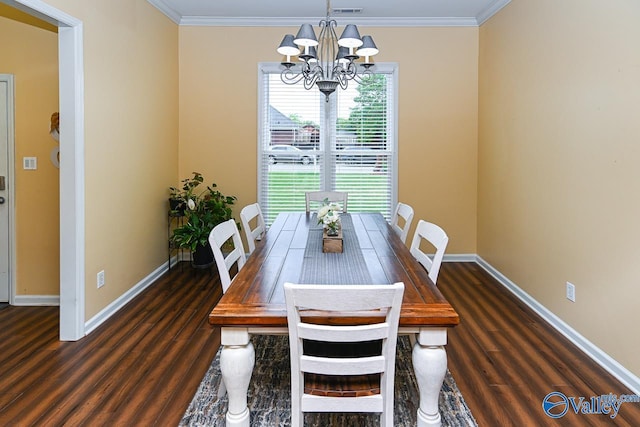 dining area with a chandelier, visible vents, baseboards, ornamental molding, and wood finished floors