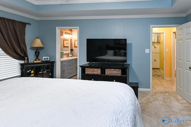 bedroom with baseboards, ensuite bath, carpet, and crown molding