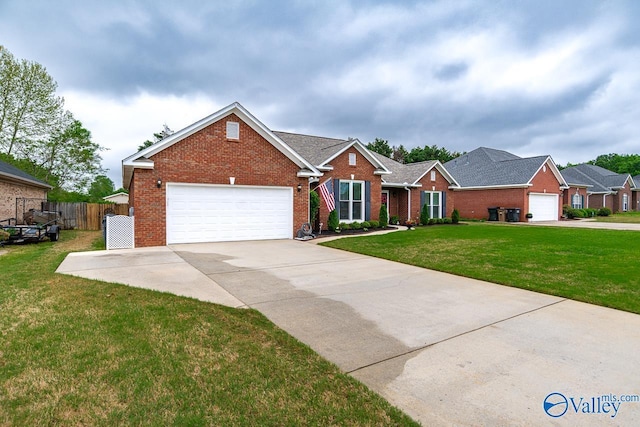 ranch-style house featuring driveway, a front yard, an attached garage, fence, and brick siding