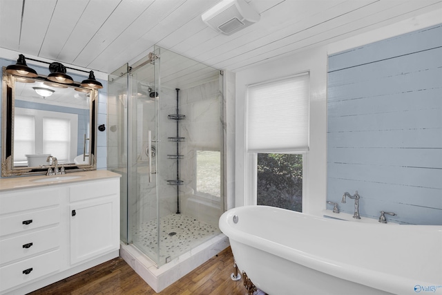 bathroom with wood-type flooring, vanity, separate shower and tub, and wood ceiling