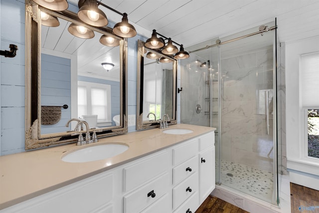 bathroom featuring wood-type flooring, an enclosed shower, and wood ceiling