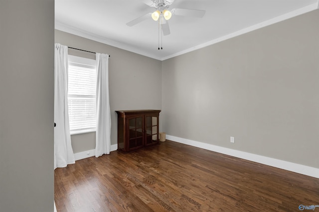 unfurnished room featuring crown molding, ceiling fan, and dark wood-type flooring