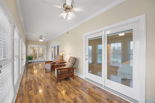 sunroom with ceiling fan and french doors